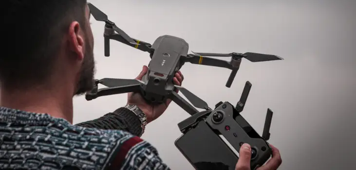 man holding Raptor 8K Drone
